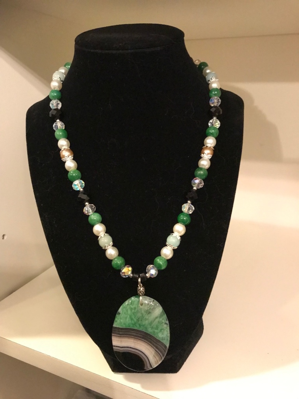 “Emerald Eclipse: Artisan necklace